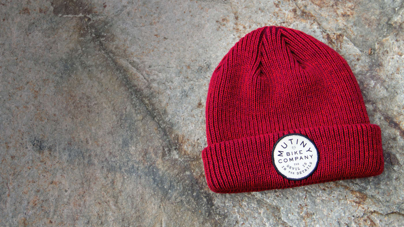 Dock-Wear Knit laying on stone