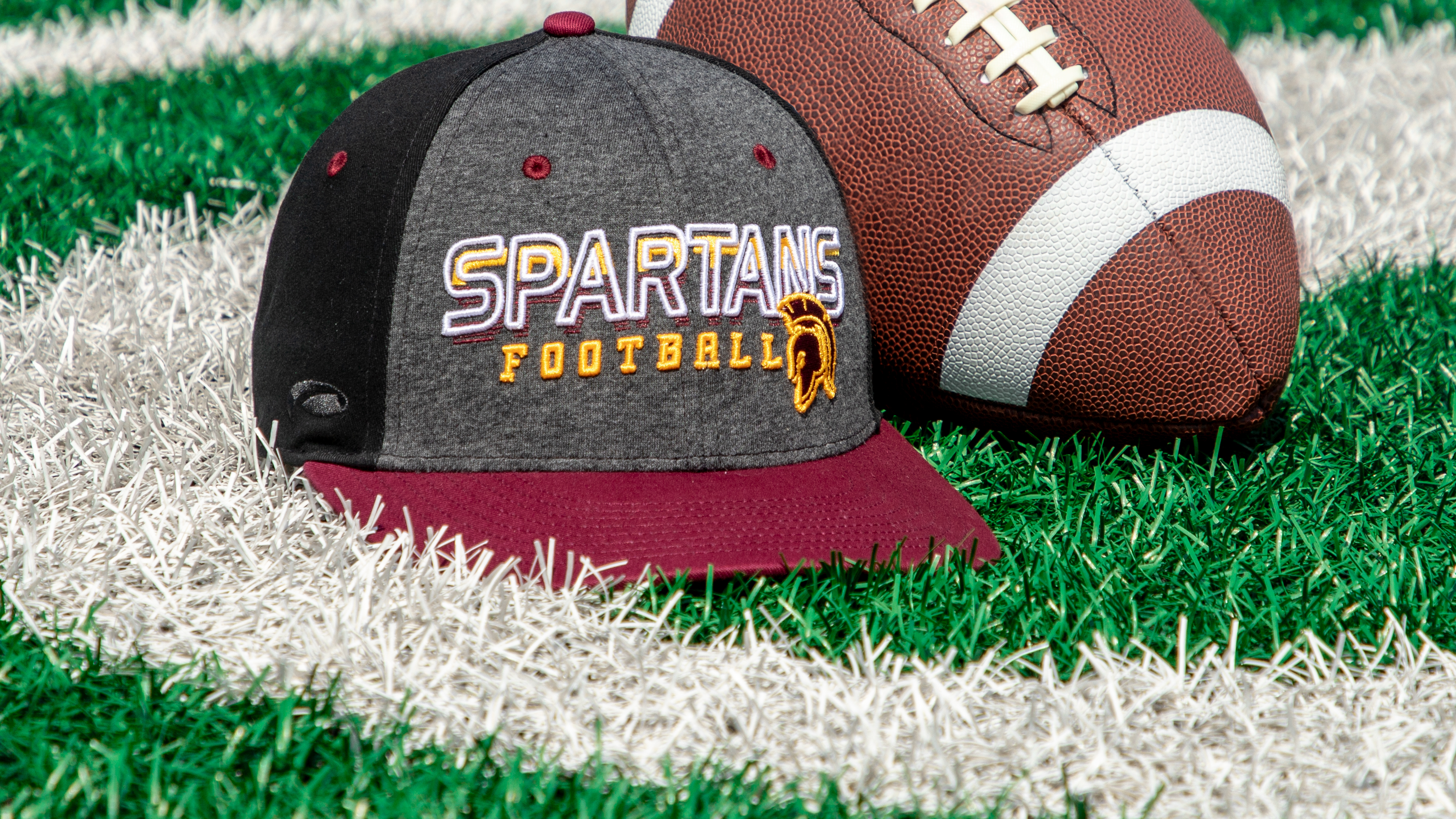 Hat sitting on football field