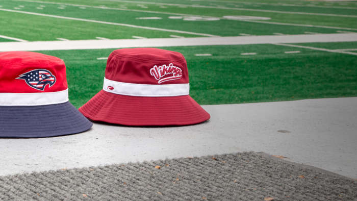 Large Brim Bucket sitting on football field