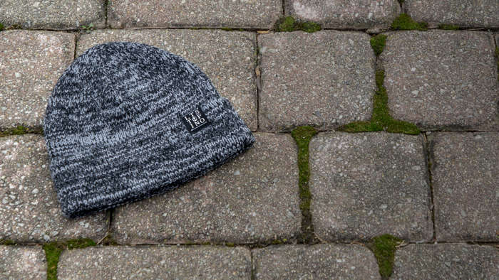 Woodberry Knit laying on stone path