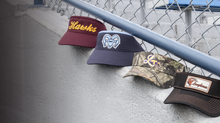 Visors sitting in grandstands