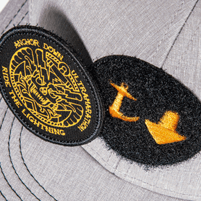 FLAT EMBROIDERY ON VELCRO PATCH WITH REMOVABLE EMBROIDERY ON FABRIC PATCH WITH MERROWED EDGE