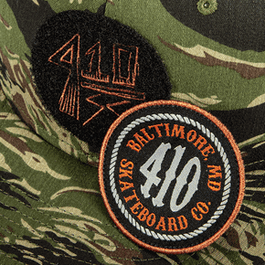 FLAT EMBROIDERY ON VELCRO PATCH WITH REMOVABLE WOVEN LABEL WITH MERROWED EDGE