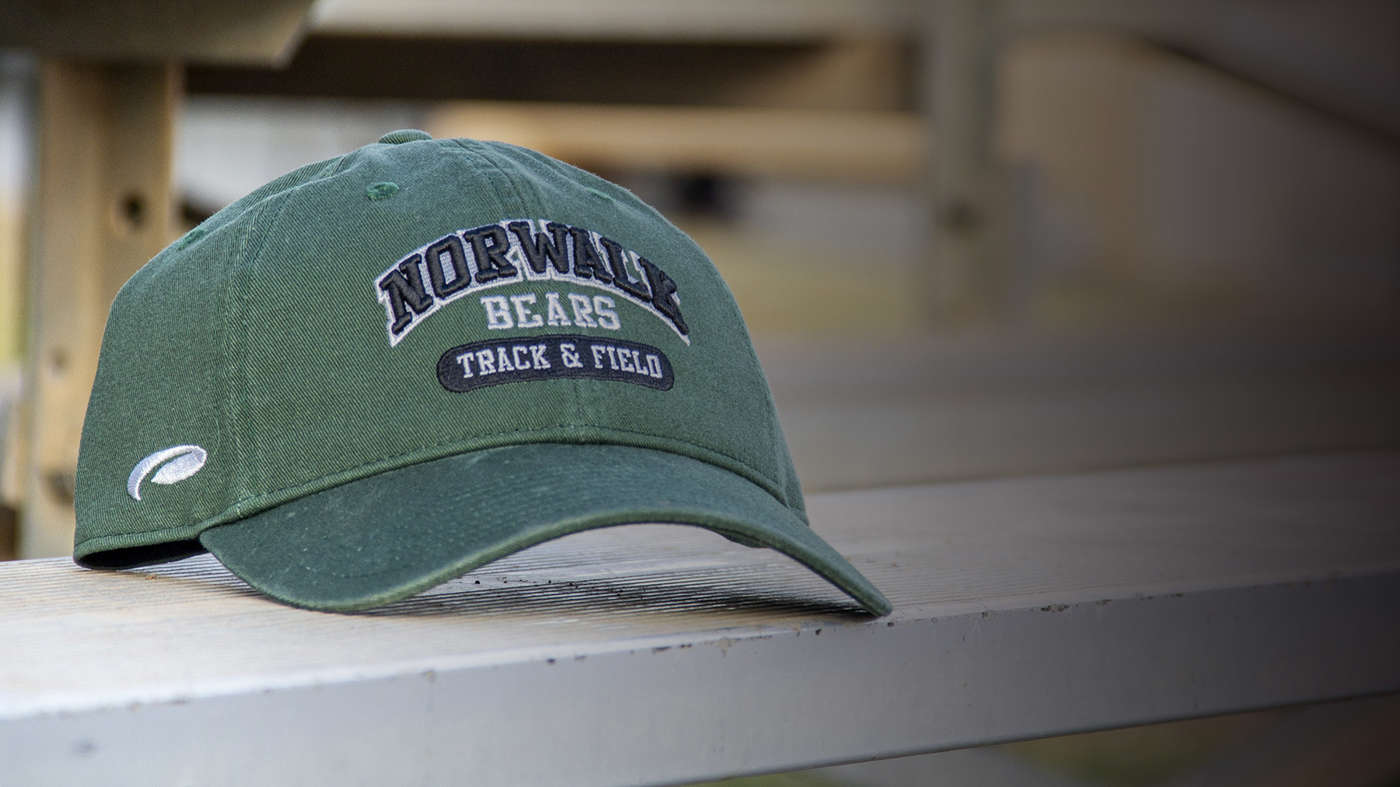 Pilot beanies on hockey ice rink