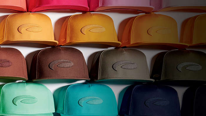 Hats of many colors stacked up