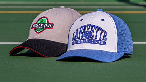 Team Sports Tennis hats on a hardcourt