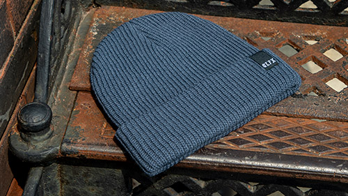 Starboard Knit laying on the street