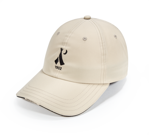 Pukka hat with sandwich visor and woven label