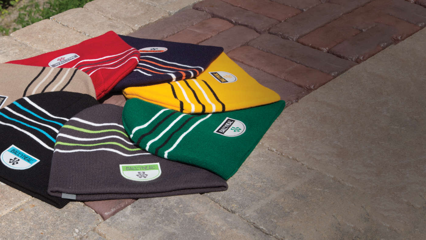 Cold Weather knits laying on stone and brick