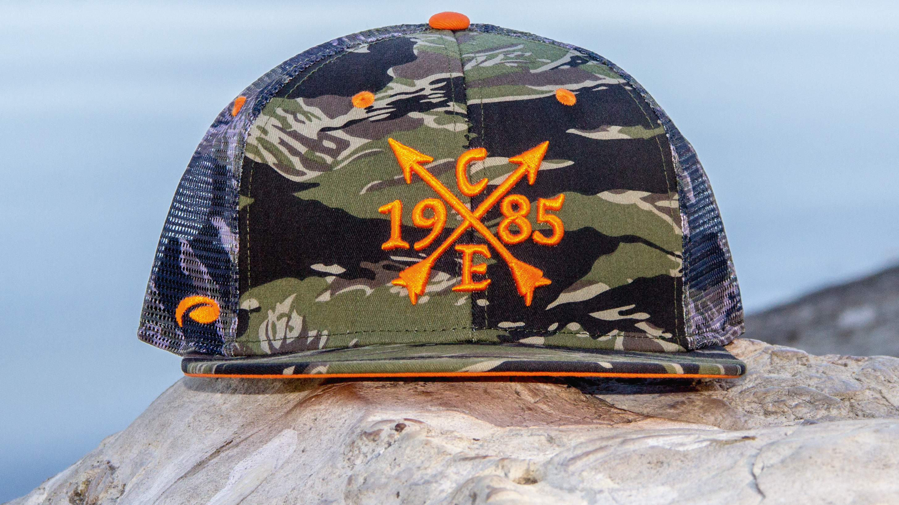 Hat sitting on large rock